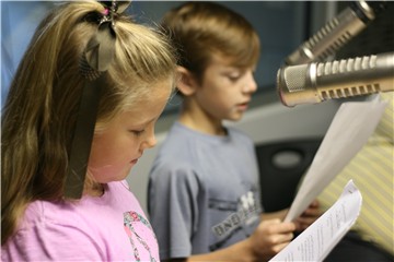 Tallassee Elementary 4th graders Ivri Russell and Grant Hall, the "TES Radio Bunch," on the Wake-Up Call in 2010