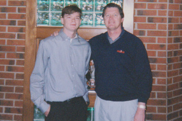 Michael Butler with ESPN college football analyst Mike Gottfried