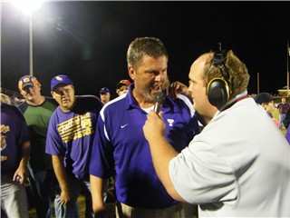 Miles Hathcock with Coach Rodney Dollar after Tallassee's 17-14 overtime win over Valley for the Region Title in 2009